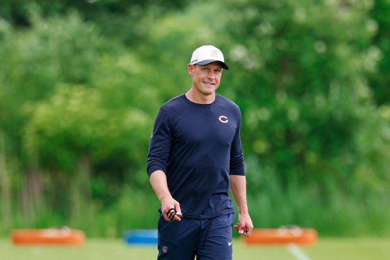 Jun 9, 2026; Lake Forest, IL, USA; Chicago Bears head coach Ben Johnson walks on the field during Chicago Bears Minicamp at Halas Hall. Mandatory Credit: Kamil Krzaczynski-Imagn Images