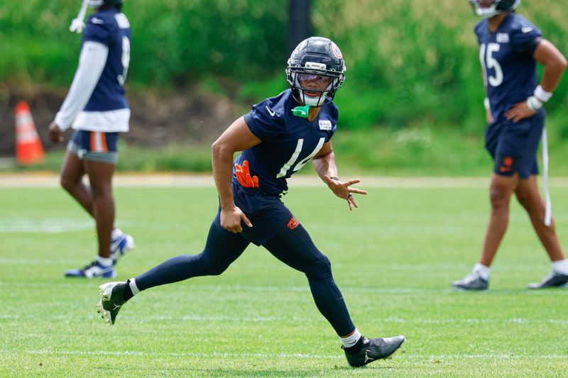 Jun 9, 2026; Lake Forest, IL, USA; Chicago Bears wide receiver Kalif Raymond (14) runs during Chicago Bears Minicamp at Halas Hall. Mandatory Credit: Kamil Krzaczynski-Imagn Images