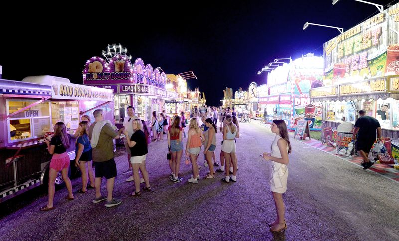 People wait in line for food at the Sangamon County Fair on Wednesday, June 10, 2026, in New Berlin.