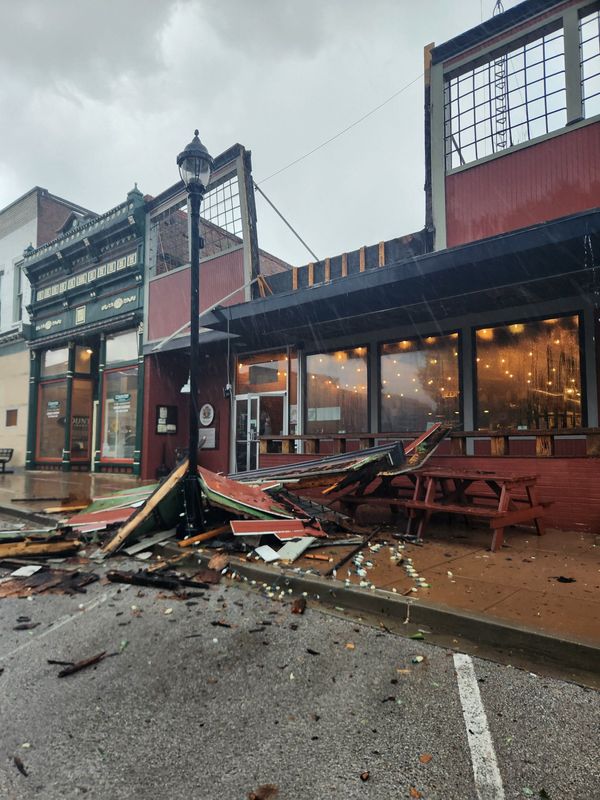 A part of the facade from Hand of Fate Brewing Company on the Petersburg town square lays on the ground June 17, 2026. Owner Brie Allison believed it was caused by wind damage. It prompted Allison to shutter the brewery/restaurant for the evening.