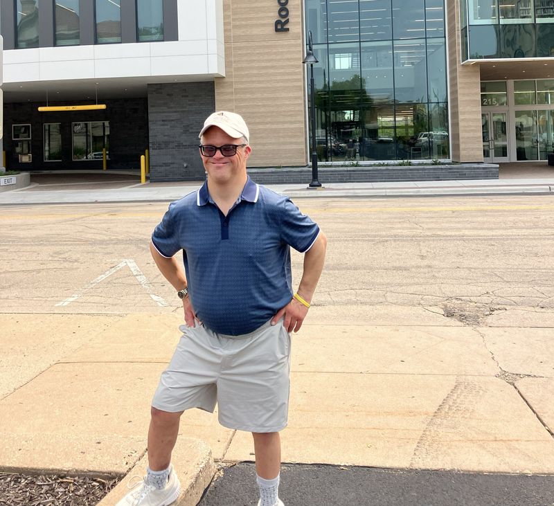 The late Steve Freeman of Rockford poses in front of the new Rockford Public Library, 215 N. Wyman St. in this undated photo.