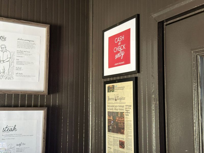 A sign at Mick and Mary's letting guests know they are a cash only business is seen on July 14, 2026, in Thayer. Mick and Mary's is one of a handful of local businesses who have ditched cards for cash only payments.