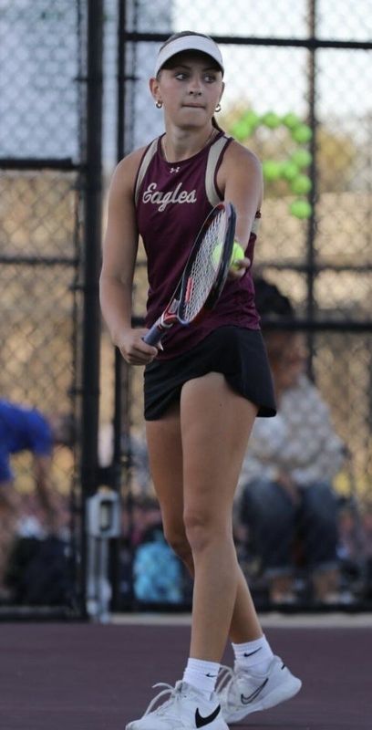 Dunlap's Katherine Brewer waits to serve during a match in the 2025 girls tennis season. The sophomore is one of the Peoria area's players to watch for 2026.