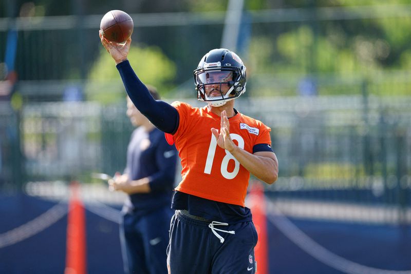 Jul 29, 2026; Lake Forest, IL, USA; Chicago Bears quarterback Caleb Williams (18) passes the ball during Training Camp at Halas Hall. Mandatory Credit: Kamil Krzaczynski-Imagn Images