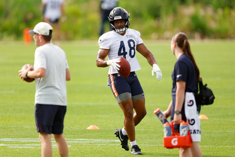 Jul 31, 2026; Lake Forest, IL, USA; Chicago Bears linebacker D'Marco Jackson (48) walks with the ball during Training Camp at Halas Hall. Mandatory Credit: Kamil Krzaczynski-Imagn Images