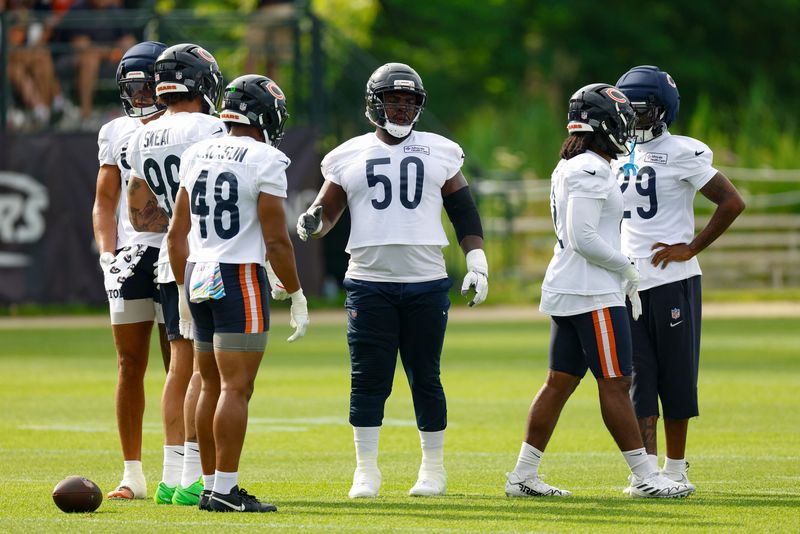 Jul 31, 2026; Lake Forest, IL, USA; Chicago Bears defensive end Grady Jarrett (50) talks to his teammates during Training Camp at Halas Hall. Mandatory Credit: Kamil Krzaczynski-Imagn Images