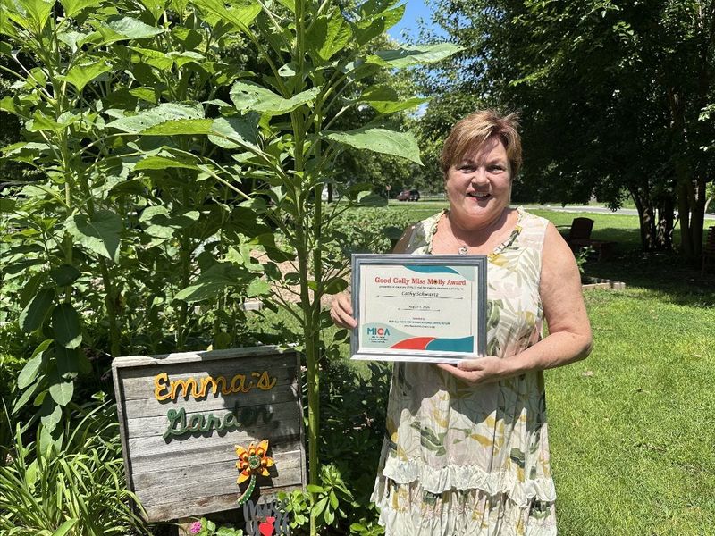 Cathy Schwartz, the inaugural winner of the of the Good Golly Miss Molly Kindness Award, which honors individuals in central Illinois who demonstrate exceptional kindness and a commitment to uplifting others within the community. The award was presented by the Mid-Illinois Communications Association and named for former television reporter Molly Hall.