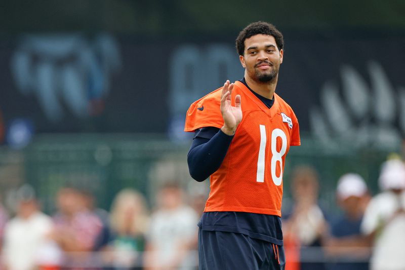 Aug 5, 2026; Lake Forest, IL, USA; Chicago Bears quarterback Caleb Williams (18) stands on the field during training camp at Halas Hall. Mandatory Credit: Kamil Krzaczynski-Imagn Images