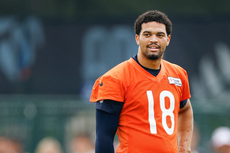 Aug 5, 2026; Lake Forest, IL, USA; Chicago Bears quarterback Caleb Williams (18) stands on the field during training camp at Halas Hall. Mandatory Credit: Kamil Krzaczynski-Imagn Images