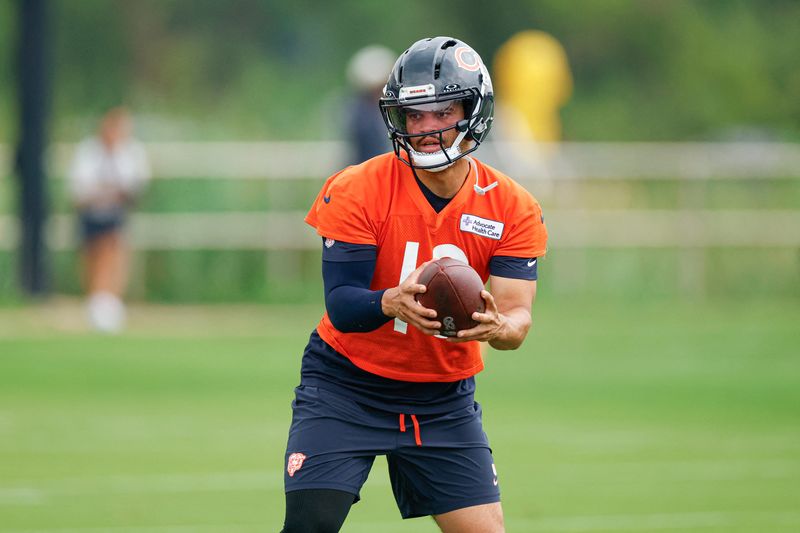Aug 5, 2026; Lake Forest, IL, USA; Chicago Bears quarterback Caleb Williams (18) looks to pass the ball during training camp at Halas Hall. Mandatory Credit: Kamil Krzaczynski-Imagn Images