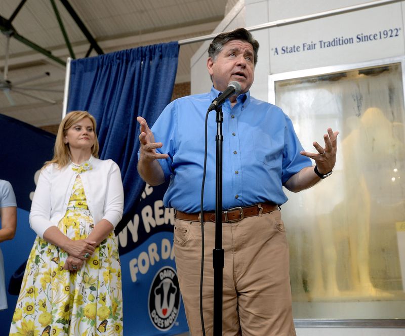 Gov. JB Pritzker speaks at the unveiling of the Butter Cow at the Illinois State Fairgrounds on Wednesday, Aug. 12, 2026, in Springfield.