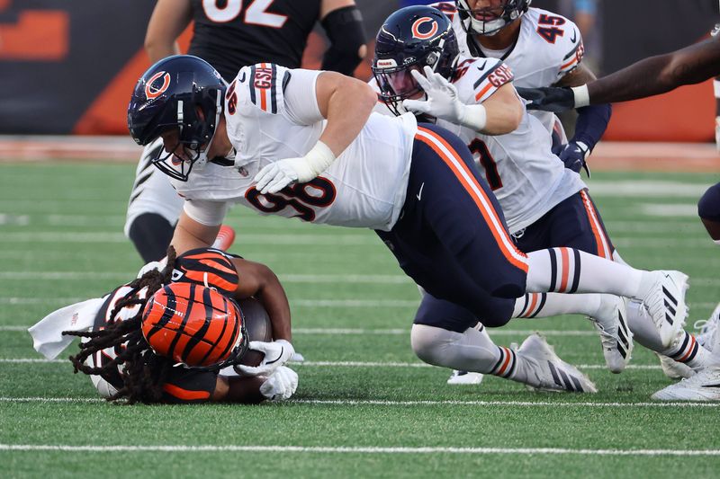 Aug 22, 2026; Cincinnati, Ohio, USA;  Chicago Bears defensive tackle Jordan van den Berg (96) makes a tackle against Cincinnati Bengals running back Kentrel Bullock (31) during the second quarter at Paycor Stadium.  Mandatory Credit: Joseph Maiorana-Imagn Images