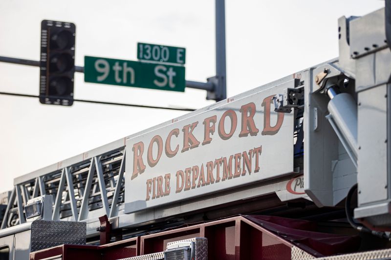 A Rockford Fire Department fire truck blocks the intersection of Broadway and Ninth streets on April 30, 2022, in Rockford after high winds damage buildings in the area.