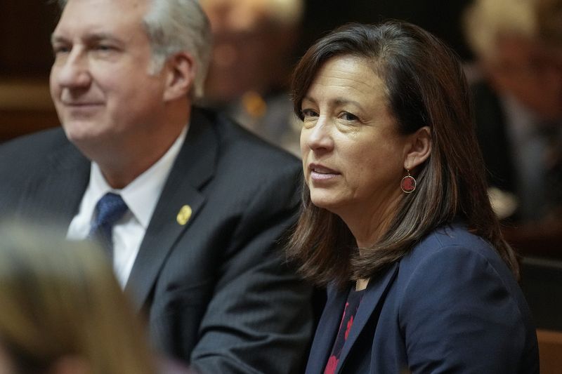 Rep. Julie McGuire partakes in the first legislative session of the year Monday, Jan. 9, 2023, at the Indiana Statehouse in Indianapolis.