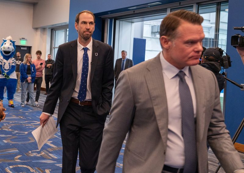 Shane Steichen, left, walks in with Colts executives before being introduced at a press conference Tuesday, Feb. 14, 2023 announcing that he is the new Indianapolis Colts Head Coach. Colts Owner and CEO Jim Irsay and General Manager Chris Ballard introduced the new coach in the Gridiron Hall of the Indiana Farm Bureau Football Center.