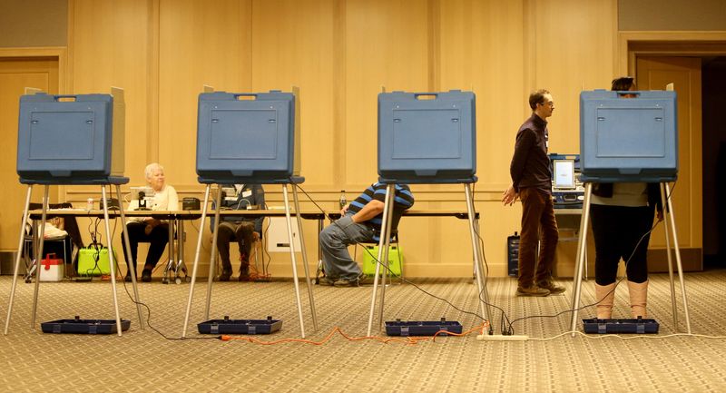 A voter uses a polling booth to cast her ballot at the voting center at the St. Joseph County Public Library ballroom Tuesday, May 2, 2023, in South Bend for the 2023 primary election.