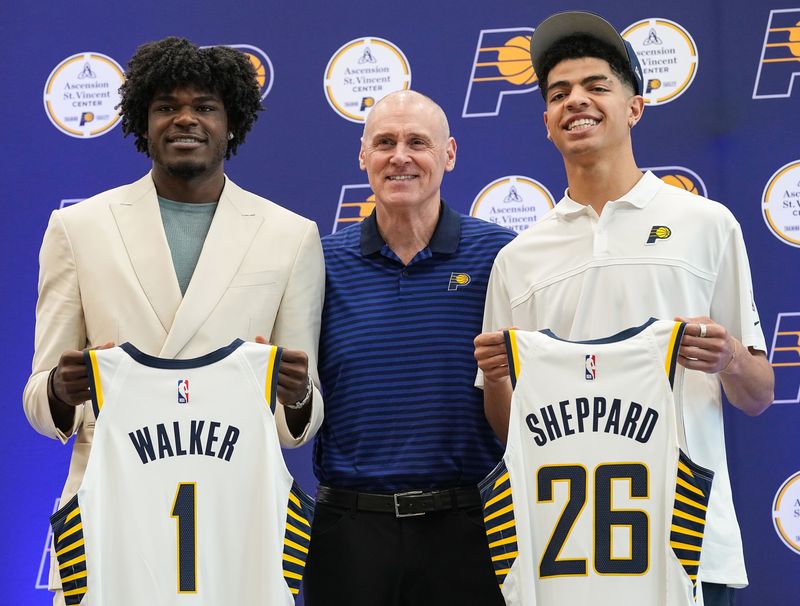 Jarace Walker (left), Rick Carlisle and Ben Sheppard pose for a photo Friday, June 23, 2023, during a press conference at Ascension St. Vincent Center in Indianapolis.