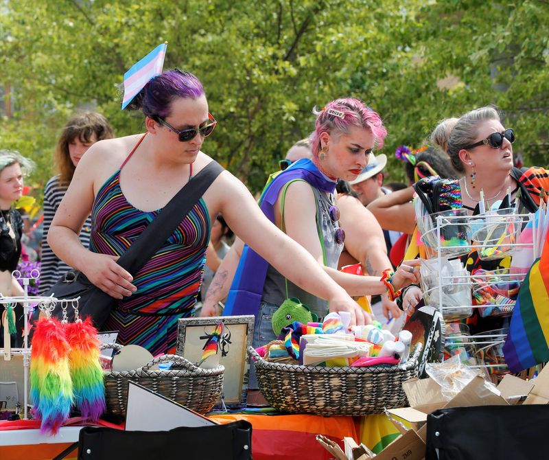 Event-goers take part in Rainbow Richmond's Pride event June 24, 2023, at Elstro Plaza.