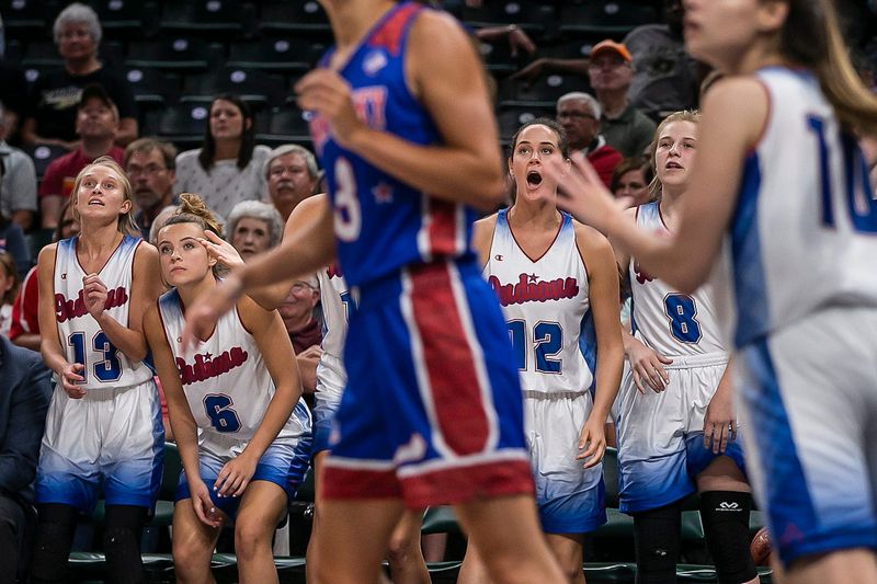 Teammates cheer on the bench in overtime during the Indiana All-Stars vs. Kentucky All-Stars game, Saturday, June 8, 2019, at Bankers Life Fieldhouse, Indianapolis. Indiana defeated Kentucky in over time, 76-71.