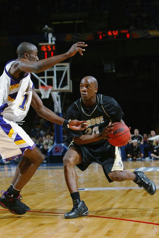 Purdue guard Kenneth Lowe drives against LSU during an 80-56 victory in Birmingham, Alabama.  Purdue defeated LSU 80-56 but fell in the second round to top-seeded Texas  77-67.