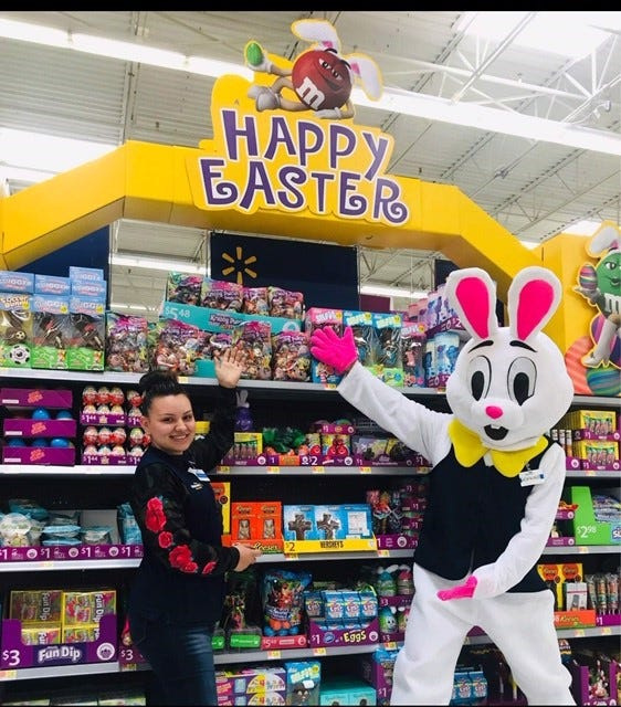 Hopkins the Easter Bunny shows off Easter products with Walmart associate Alexandra Apodaca at the Walmart on 1550 S Valley Dr. Saturday, April 6.