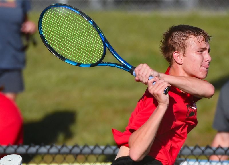 Edgewood’s Andrew Paul hits a shot during his No.1 singles match against Bloomington South’s David Ciucu during the IHSAA Boys’ tennis sectional at South on Thursday, Sept. 28, 2023.