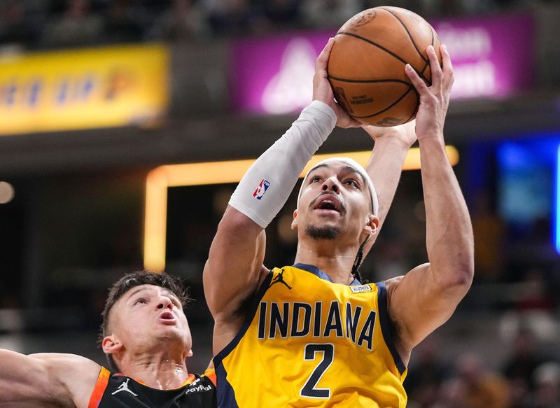 Indiana Pacers guard Andrew Nembhard (2) goes in for a lay-up Friday, Jan. 26, 2024, during the game at Gainbridge Fieldhouse in Indianapolis. The Indiana Pacers defeated the Phoenix Suns, 133-131.