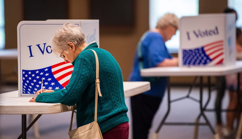 Elizabeth Gallman votes at Sherwood Oaks Christian Church to vote on Tuesday, May 7, 2024.