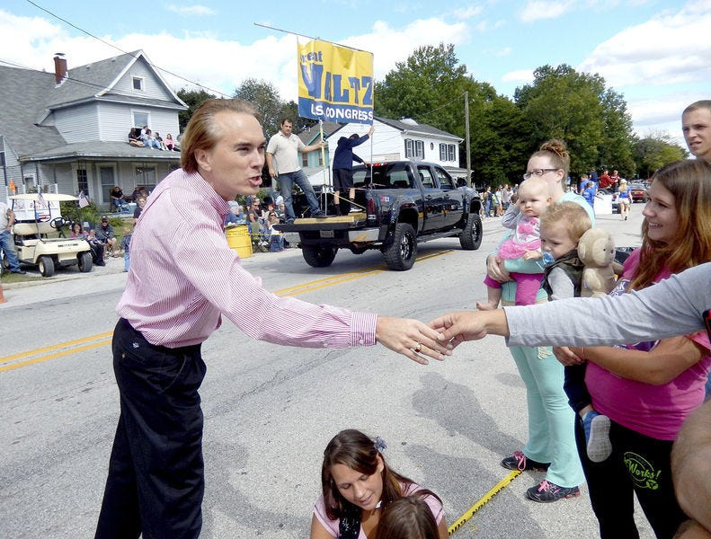 Former State Sen. Brent Waltz shake hands with voters during his unsuccessful bid for the Republican nomination to run for Congress.