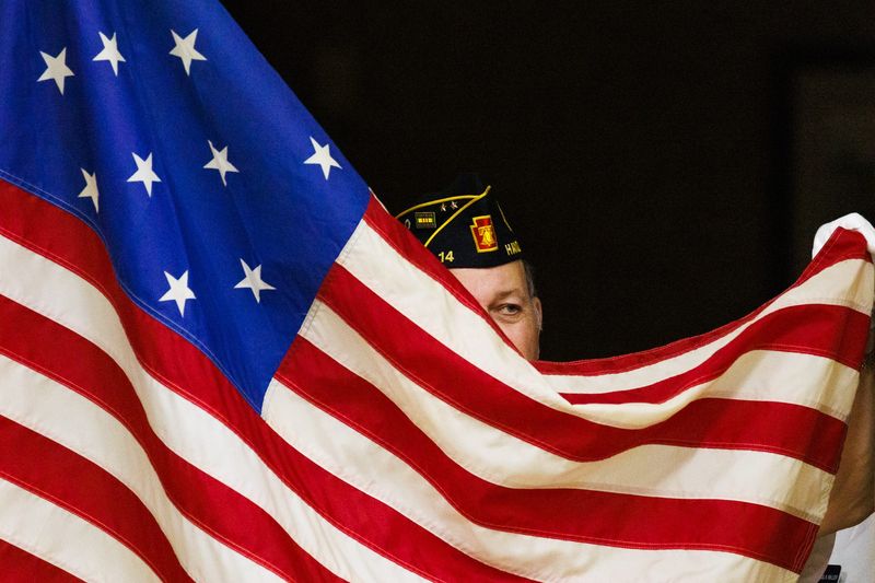 The Allied Veterans Honor Guard carries historic versions of the American flag during a flag day service held by the Hanover Elks, Sunday, June 9, 2024, in Hanover Borough.