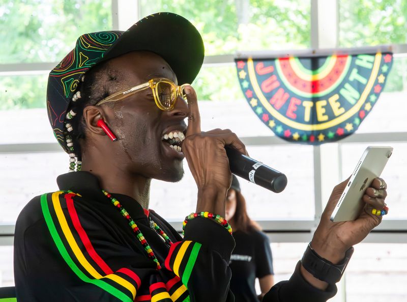 Bloomington poet PDVNCH reads a long form poem during the Underground Railroad marker reveal during the annual Juneteenth Celebration at Switchyard Park on Saturday, June 15, 2024. This year’s celebration will include a matinee performance of Indiana University Camp S.O.U.L.