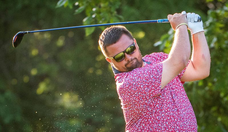 Mitch Oard hits off the first tee at Cascades Golf Course in his match in the Bloomington City Golf Tournament on Sunday, July 7, 2024.