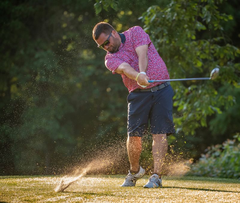 Mitch Oard hits off the first tee at Cascades Golf Course in his match in the Bloomington City Golf Tournament on Sunday, July 7, 2024.