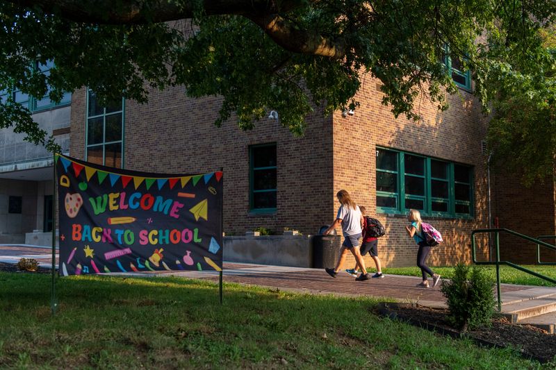 Kids head back to school at Dexter Elementary in Evansville, Ind., Monday, Aug. 5, 2024.