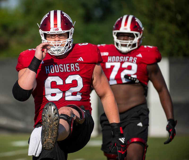 Indiana University's Drew Evans (62) stretches during fall practice at the Mellencamp Pavilion at Indiana University on Thursday, Aug. 8, 2024.