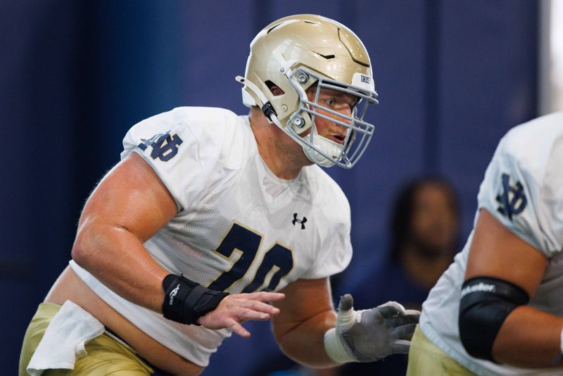 Notre Dame offensive lineman Ashton Craig participates in a drill during a Notre Dame football practice at Irish Athletic Center on Thursday, Aug. 15, 2024, in South Bend.