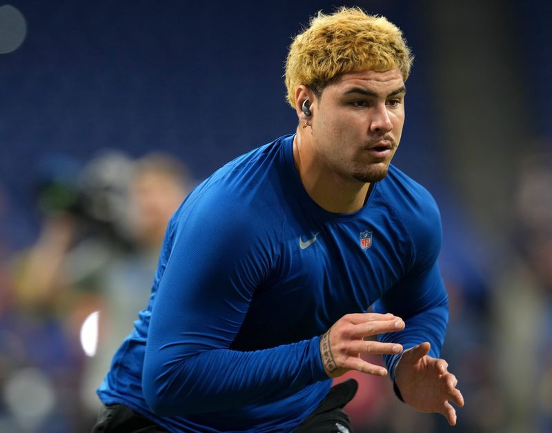 Indianapolis Colts defensive end Laiatu Latu (97) warms up Sunday, Sept. 22, 2024, before an Indianapolis Colts game against the Chicago Bears at Lucas Oil Stadium.