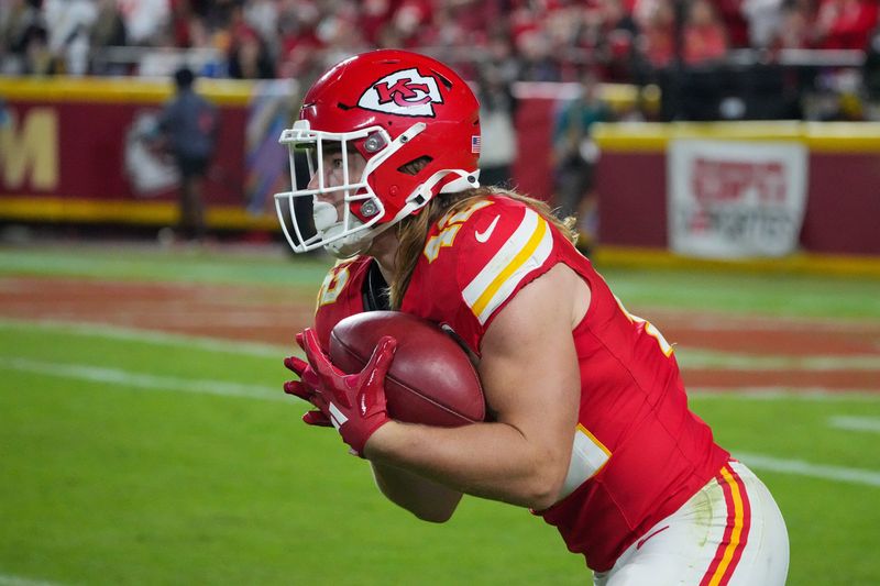 Oct 7, 2024; Kansas City, Missouri, USA; Kansas City Chiefs running back Carson Steele (42) returns a kick against the New Orleans Saints during the second half at GEHA Field at Arrowhead Stadium. Mandatory Credit: Denny Medley-Imagn Images
