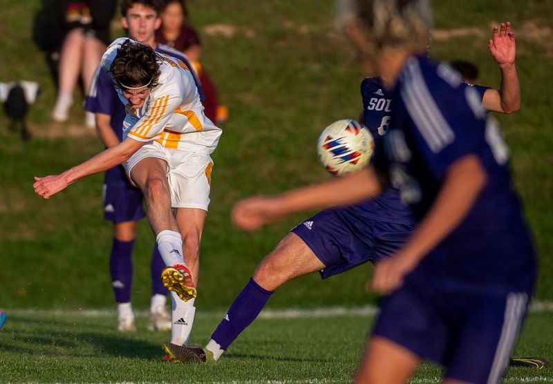 North's Arno Risner (13) passes during the Bloomington North versus Bloomington South boys soccer match during the IHSAA sectional game at Bloomington High School South on Wednesday, Oct. 9, 2024