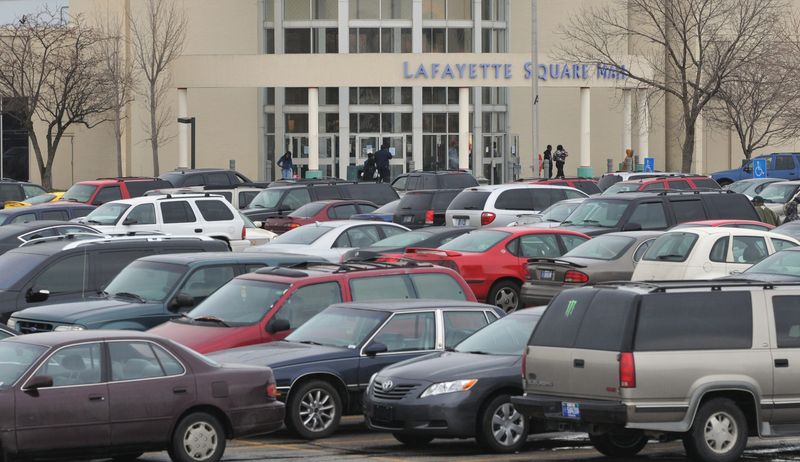 The cars of last minute Christmas shoppers almost filled the parking lot along Lafayette Road at the Lafayette Square Mall Thursday Dec., 24, 2009.