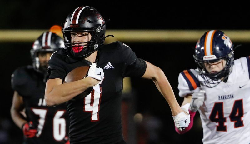 Lafayette Jeff Bronchos wide receiver Bryce Vanostran (4) carries the ball into the end zone for a touchdown Friday, Oct. 11, 2024, during the IHSAA football game against the Harrison Raiders at Lafayette Jeff High School in Lafayette, Ind. Lafayette Jeff won 45-21.