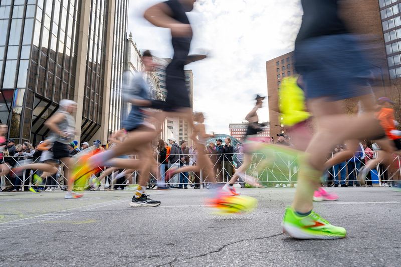 Runners compete in the 17th Annual Indianapolis Monumental Marathon Saturday, Nov. 9, 2024, which begins and ends near the Indiana Statehouse in downtown Indianapolis. The 26.2-mile course, known for its flat, fast route, winds throughout the city.