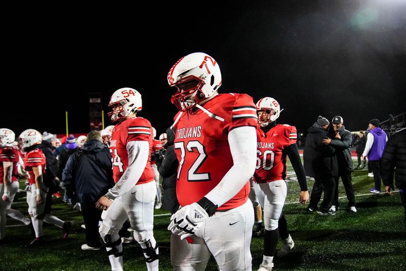 Center Grove CJ Scifres (72) walks off the field after the team lost Friday, Nov. 22, 2024, during a semistate game between Center Grove and Brownsburg at Center Grove High School in Greenwood. The Bulldogs defeated Center Grove, 31-27.
