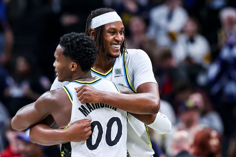 Indiana Pacers guard Bennedict Mathurin (00) and Indiana Pacers center Myles Turner (33) celebrate Sunday, Nov. 24, 2024, after winning a game between the Indiana Pacers and the Washington Wizards at Gainbridge Fieldhouse in Indianapolis. The Pacers defeated the Wizards, 115-103.