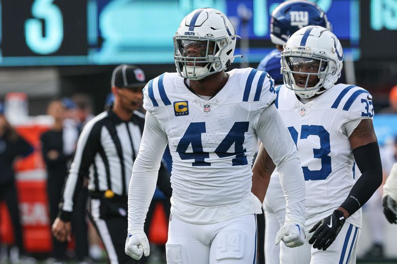 Dec 29, 2024; East Rutherford, New Jersey, USA; Indianapolis Colts linebacker Zaire Franklin (44) celebrates a defensive stop during the first half against the New York Giants at MetLife Stadium. Mandatory Credit: Vincent Carchietta-Imagn Images