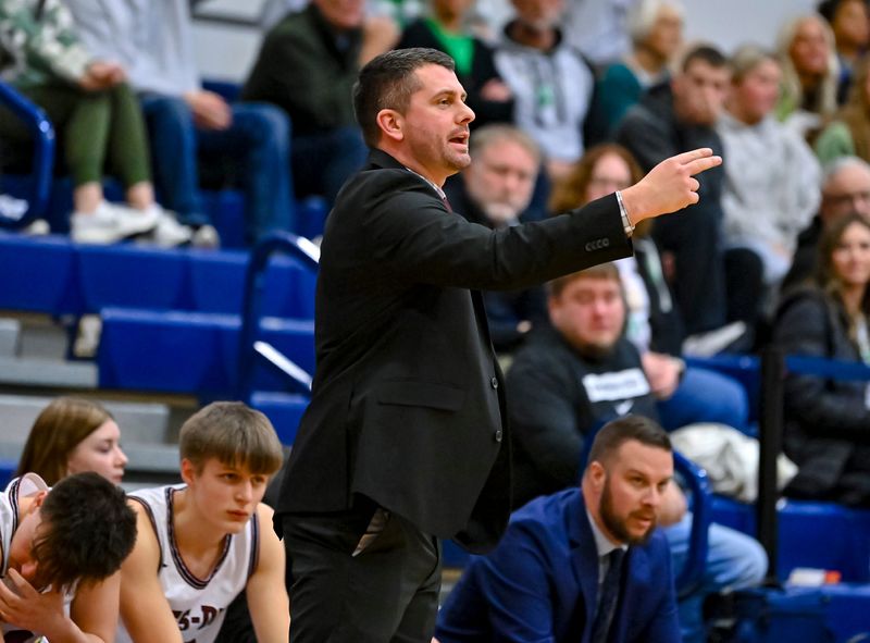 Wes-Del boys basketball coach Josh Burkett coaches the Warriors during the first round of the 2025 Delaware County boys basketball tournament on Wednesday, Jan. 15, 2025.