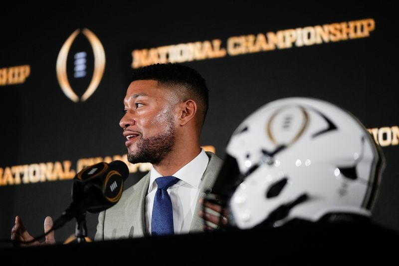 Notre Dame Fighting Irish head coach Marcus Freeman speaks during a press conference with Ohio State Buckeyes head coach Ryan Day prior to their College Football Playoff championship matchup in Atlanta on Jan. 19, 2025.