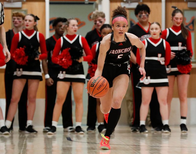 Lafayette Jeff Bronchos guard Maya Layton (5) drives to the basket Saturday, Feb. 8, 2025, during the IHSAA girls basketball sectional championship game against the McCutcheon Mavericks at Harrison High School in West Lafayette, Ind. McCutcheon won 51-43.