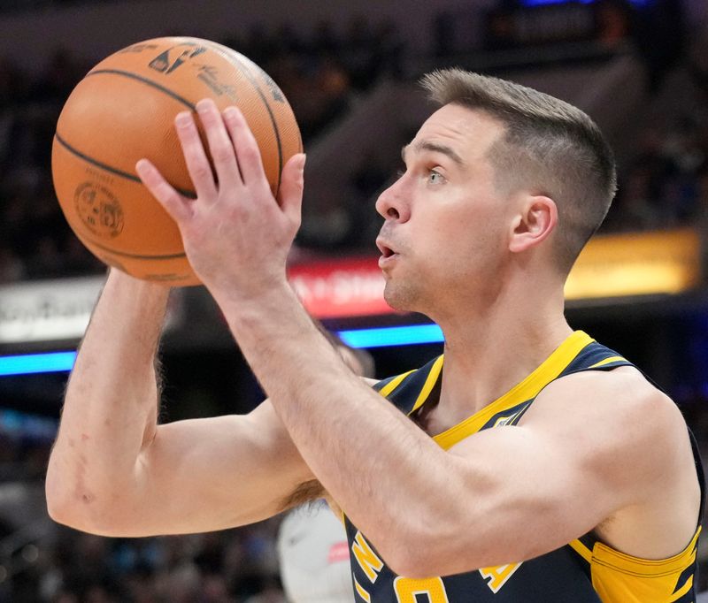 Indiana Pacers guard TJ McConnell attempts a three-point field goal against the New York Knicks during the first half of a game Tuesday, Feb. 11, 2025, at Gainbridge Fieldhouse in Indianapolis.