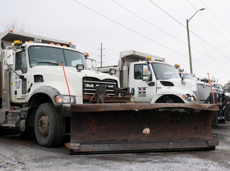 Indianapolis Department of Public Works trucks sit ready for use to plow and salt the roads Thursday, Feb. 13, 2025, at 1725 South West Street in Indianapolis.